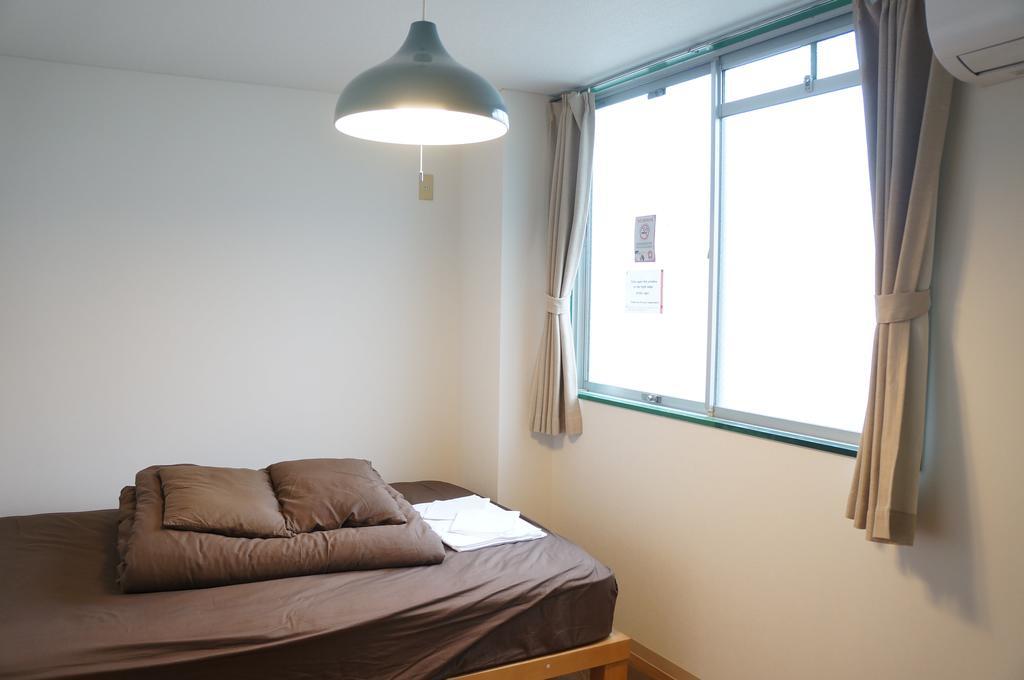 J-Hoppers Osaka Guesthouse Bagian luar foto